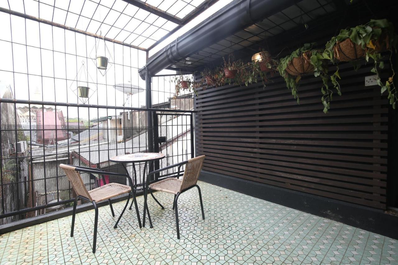 Spot On 90141 Threehouse Bed & Breakfast Kuching Exterior photo